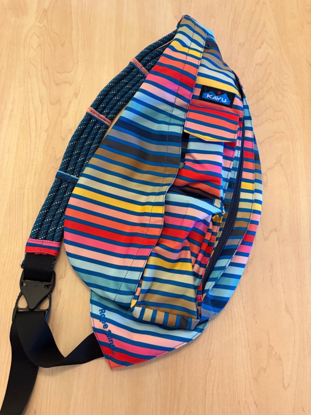Kavu Multicolor Striped Sling Pack in Blue, Yellow, Red